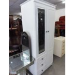 A MODERN WHITE FINISH TWO DOOR COMBINATION WARDROBE WITH EXTERIOR MIRROR AND THRE SHORT DRAWERS