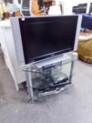 PHILIPS FLAT SCREEN TELEVISION, 26?, WITH THREE-TIER STAND WITH PLATE GLASS SHELVES, ALSO A BT