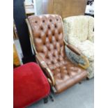 A REPRODUCTION LEATHER UPHOLSTERED REGENCY REVIVAL CHAIR