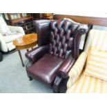 LEATHER RED BUTTONED BACK CHESTERFIELD ARMCHAIR, ON CABRIOLE LEGS