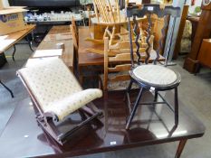 A MAHOGANY ROCKING GOUT STOOL AND A STAINED BEECH WOOD NURSING CHAIR WITH ROUND PAD SEAT (2)