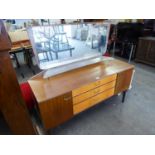 LEBUS 1960S LONG, LOW DRESSING TABLE WITH LONG MIRROR OVER A GLASS SHELF