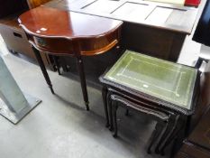 A MAHOGANY SEMI-CIRCULAR HALL TABLE, WITH SERPENTINE OUTLINE AND A DRAWER; A NEST OF THREE