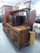 A CIRCA 1900's CARVED OAK MIRROR BACK SIDEBOARD