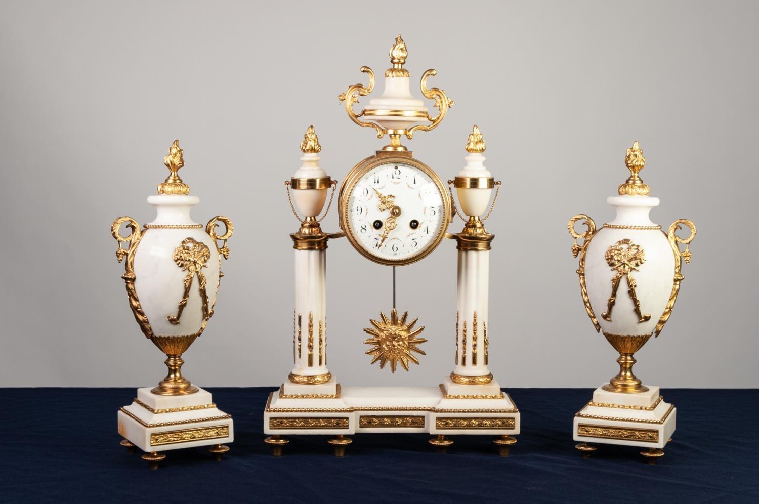 A LATE NINETEENTH/EARLY TWENTIETH CENTURY FRENCH WHITE ALABASTER GILDED BRASS MOUNTED CLOCK