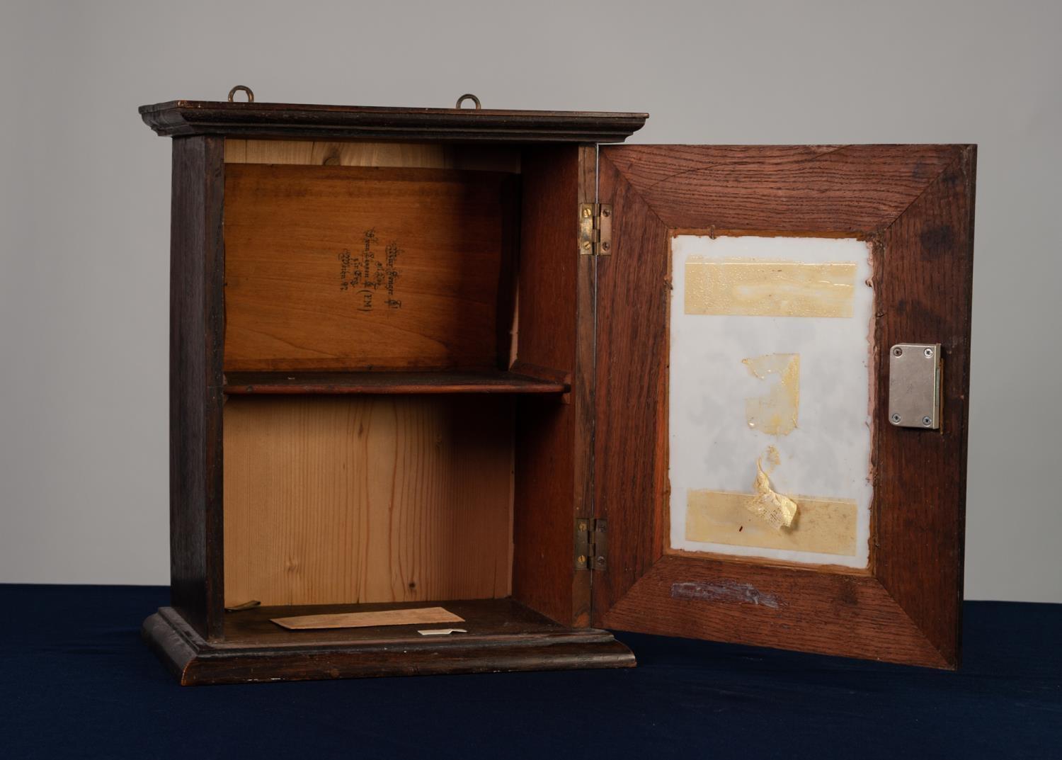 EARLY TWENTIETH CENTURY GERMAN DARK OAK AND MILK GLASS SMALL MURAL CABINET, the moulded cornice - Image 2 of 2