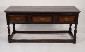 EIGHTEENTH CENTURY OAK DRESSER, the moulded oblong top above three moulded drawers, fitted with a