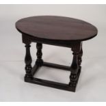 ANTIQUE OAK AND MAHOGANY COMPOSITE OCCASIONAL TABLE, the lift-off oval top above an oblong base with