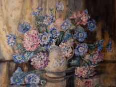 MARION BROOM (Twentieth Century) WATERCOLOUR Flowers in a moulded jugSigned lower right 21 1/4" x 28