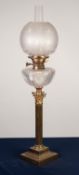 VICTORIAN BRAS CORINTHIAN COLUMN PATTERN OIL TABLE LAMP, with stepped, square base, diamond cut