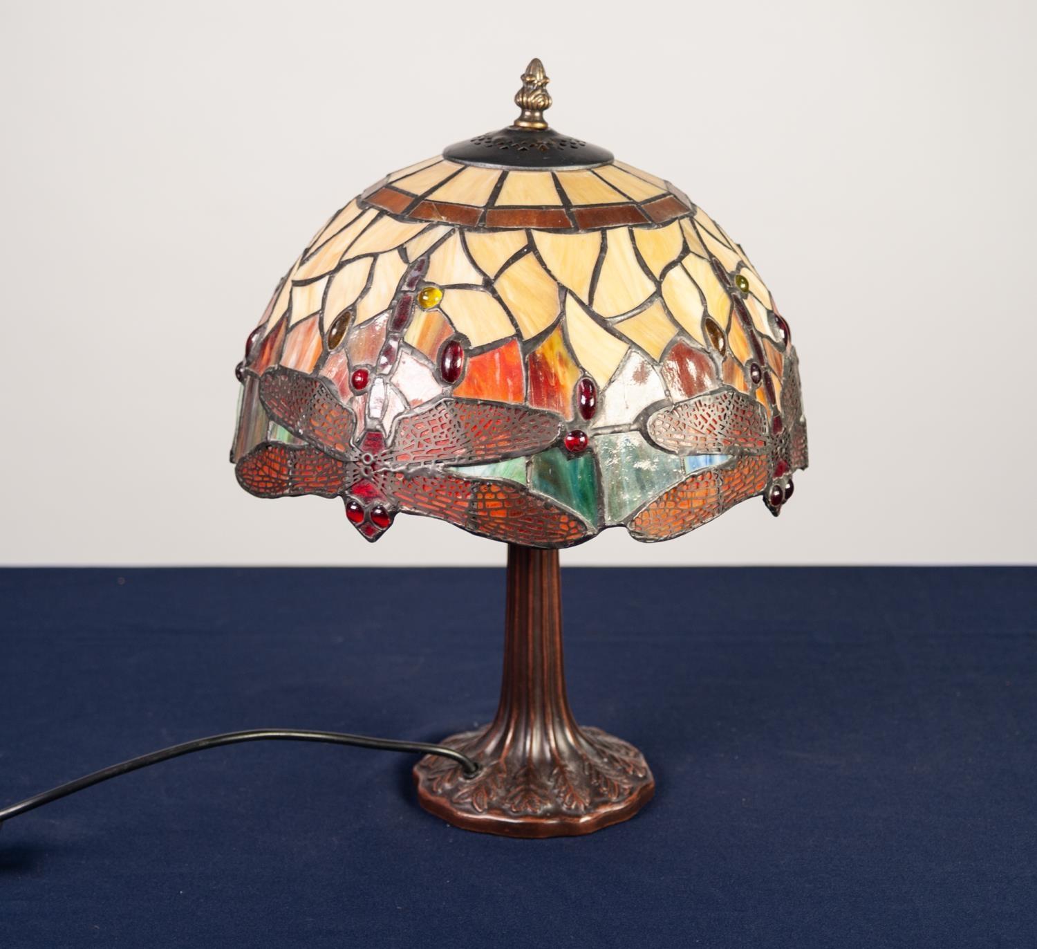 MODERN TIFFANY STYLE TABLE LAMP, the patinated base moulded with leaves, beneath a domed and