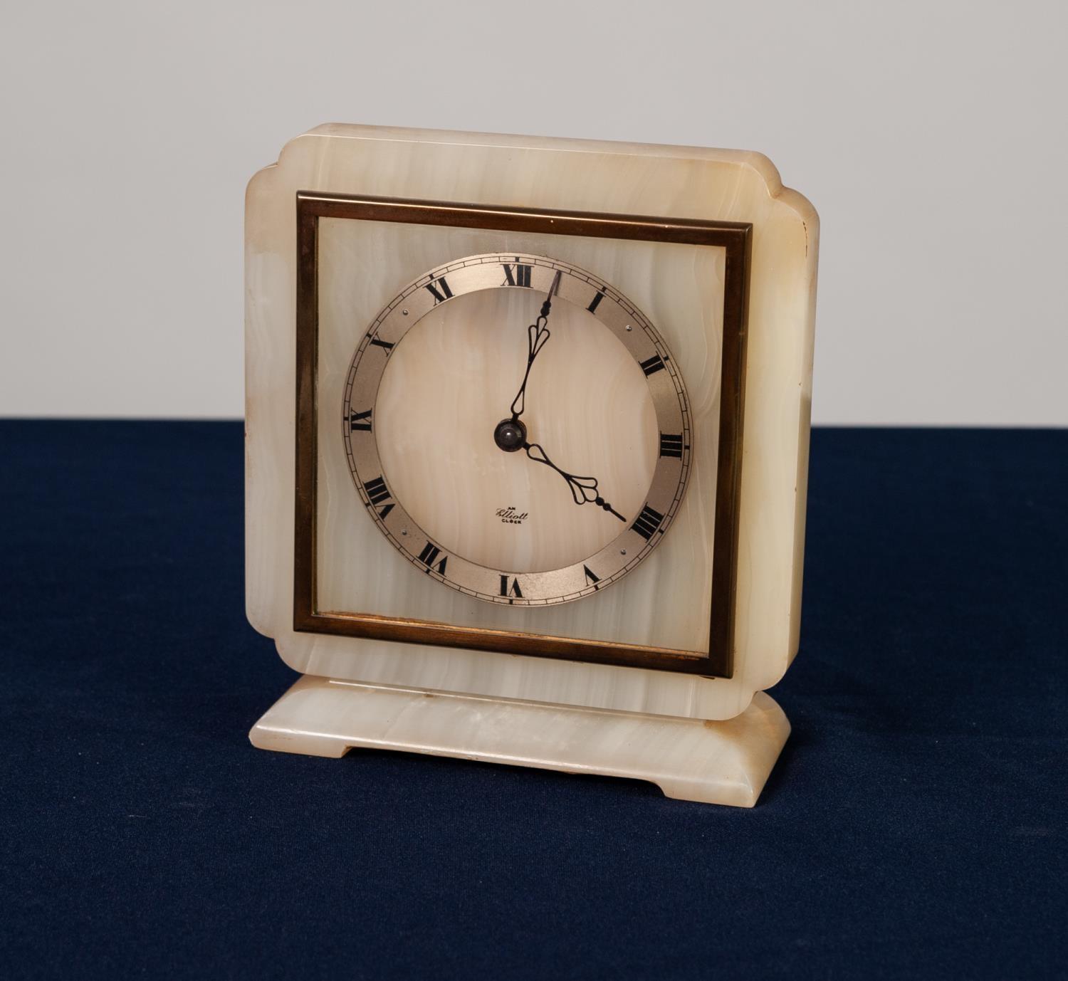 ELLIOTT WHITE ONYX AND GILT METAL MANTLE CLOCK, square, with in-turned corners and oblong base,