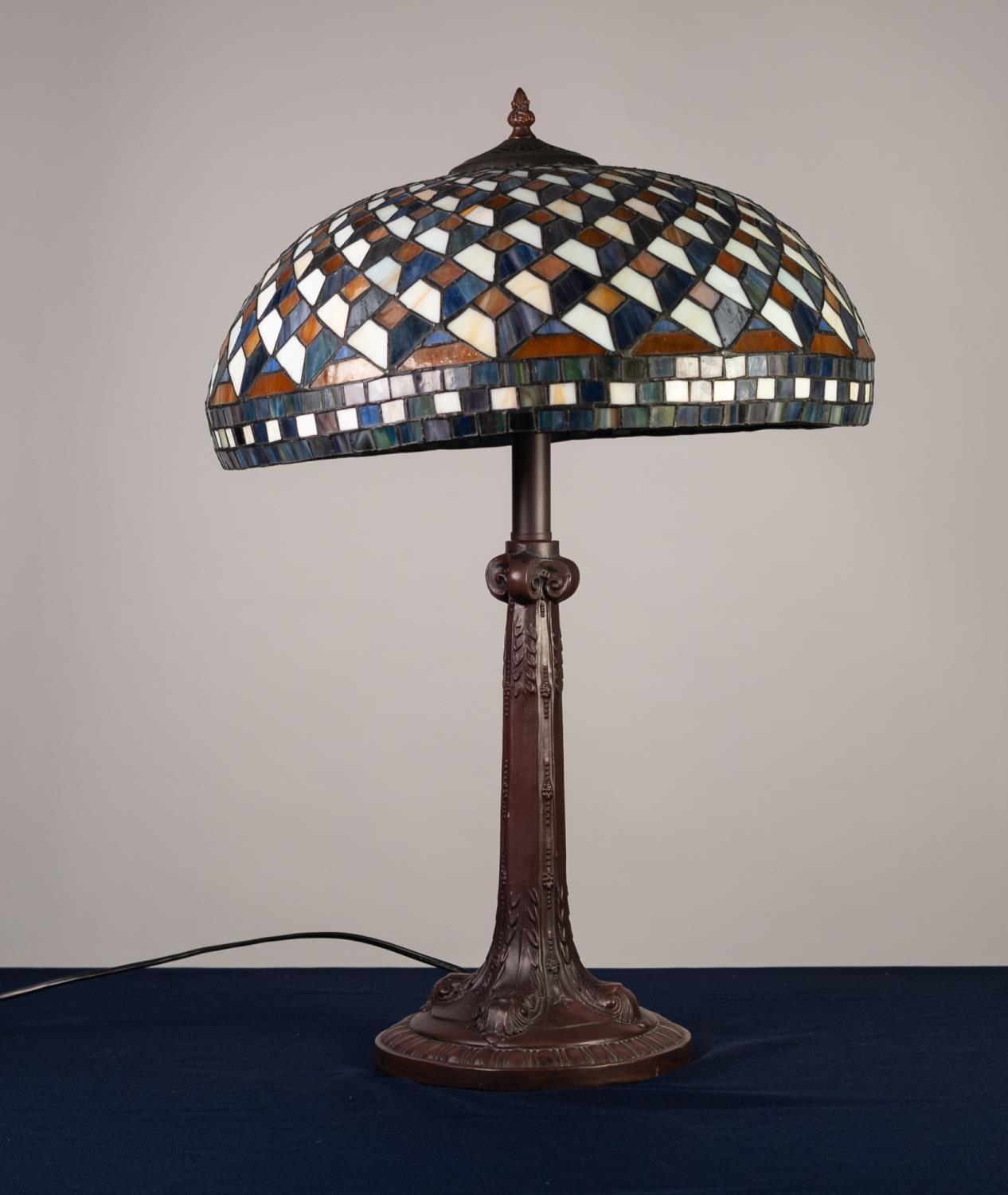 MODERN TIFFANY STYLE TWIN LIGHT TABLE LAMP, the coloured resin base moulded with scrolls, and the