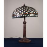 MODERN TIFFANY STYLE TWIN LIGHT TABLE LAMP, the coloured resin base moulded with scrolls, and the