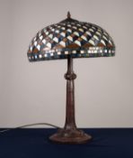 MODERN TIFFANY STYLE TWIN LIGHT TABLE LAMP, the coloured resin base moulded with scrolls, and the