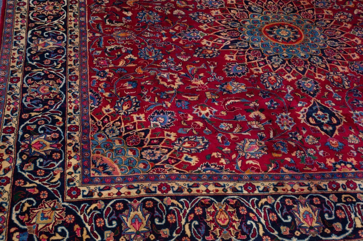 MESHED PERSIAN CARPET with floral and petal shaped circular centre medallion with pendants and - Image 3 of 5