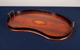 EDWARDIAN INLAID MAHOGANY KIDNEY SHAPED TWO HANDLED TRAY, with oval shell inlay to the centre, 24? x