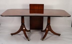 G.T. RACKSTRAW, WORCESTER REGENCY STYLE MAHOGANY NARROW OBLONG DOUBLE PEDESTAL DINING TABLE, with