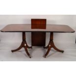 G.T. RACKSTRAW, WORCESTER REGENCY STYLE MAHOGANY NARROW OBLONG DOUBLE PEDESTAL DINING TABLE, with