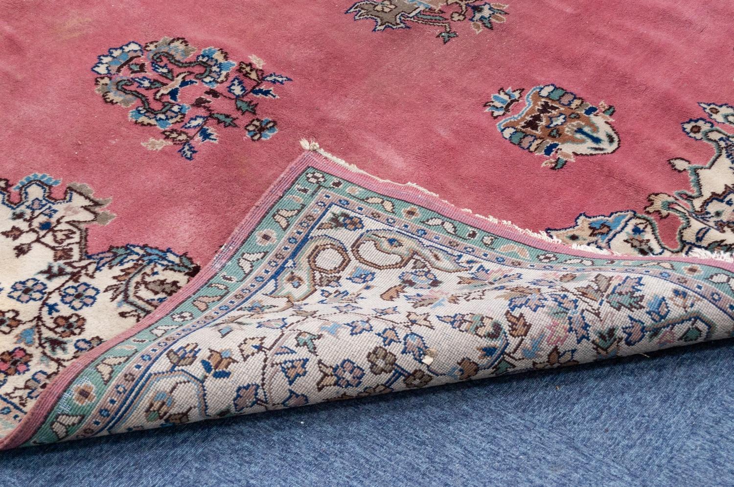 LARGE, POSSIBLY EUROPEAN, PERSIAN STYLE CARPET, having a rose pink field, large green, brown and - Image 3 of 3