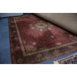 GROSVENOR WILTON ALL WOOL PILE BORDERED CARPET OF PERSIAN DESIGN, with radiating circular centre