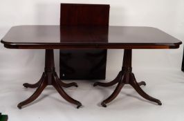 MODERN REPRODUCTION MAHOGANY DINING TABLE, WITH EXTRA LEAF, AND SET OF TEN SINGLE DINING CHAIRS, the