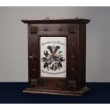 EARLY TWENTIETH CENTURY GERMAN DARK OAK AND MILK GLASS SMALL MURAL CABINET, the moulded cornice