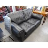 GOOD QUALITY LARGE BLACK LEATHER TWO SEATER SETTEE ON FEET