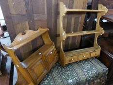 A SMALL OAK PLATE RACK, HAVING THREE SHELVES AND THREE SMALL DRAWERS, AND A SMALL MURAL WALL