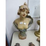 POSSIBLY AUSTRIAN EARLY TWENTIETH CENTURY PLASTER BUST OF SEMI DRAPED YOUNG WOMAN, HAIR PINNED UP,