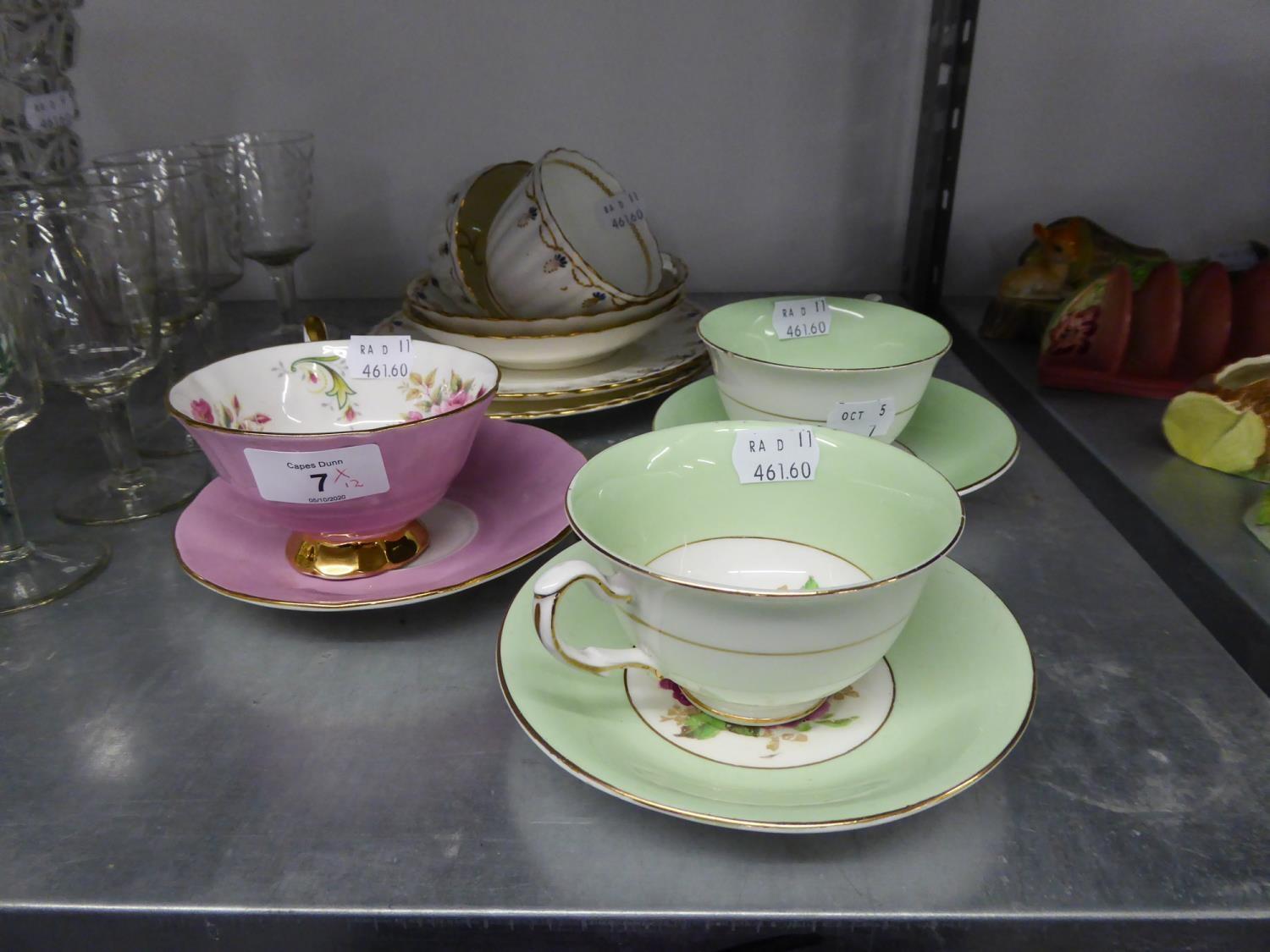TWO TRIOS OF 19TH CENTURY FLUTED CHINA TEACUPS, SAUCERS AND SIDE PLATES AND THREE CHINA SPECIMEN