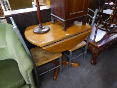 A CIRCULAR DINING TABLE, ON COLUMN AND FOUR SPUR BASE AND A PAIR OF GREY METAL SINGLE CHAIRS WITH