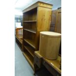 * A LARGE GOOD QUALITY PINE OPEN BOOKCASE, HAVING FIVE ADJUSTABLE SHELVES AND A TONGUE AND GROOVE