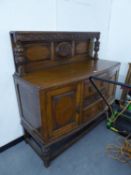 OAK CARVED SIDEBOARD, HAVING THREE CENTRAL DRAWERS AND CUPBOARD DOORS WITH CANOPY BACK