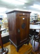 AN EARLY TWENTIETH CENTURY CARVED MAHOGANY BEDSIDE CUPBOARD