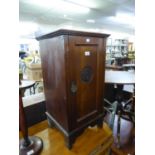 AN EARLY TWENTIETH CENTURY CARVED MAHOGANY BEDSIDE CUPBOARD