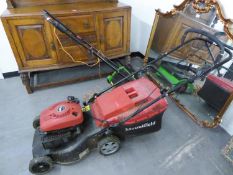 A MOUNTFIELD 'RV 150' PETROL LAWN MOWER AND A FLORABEST ELECTRIC SCARIFIER/LAWN AERATOR (2)