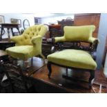 AN EDWARDIAN TUB SHAPED ARMCHAIR, HAVING FANCY FRAMEWORK AND AN UPHOLSTERED ARMCHAIR WITH BUTTON