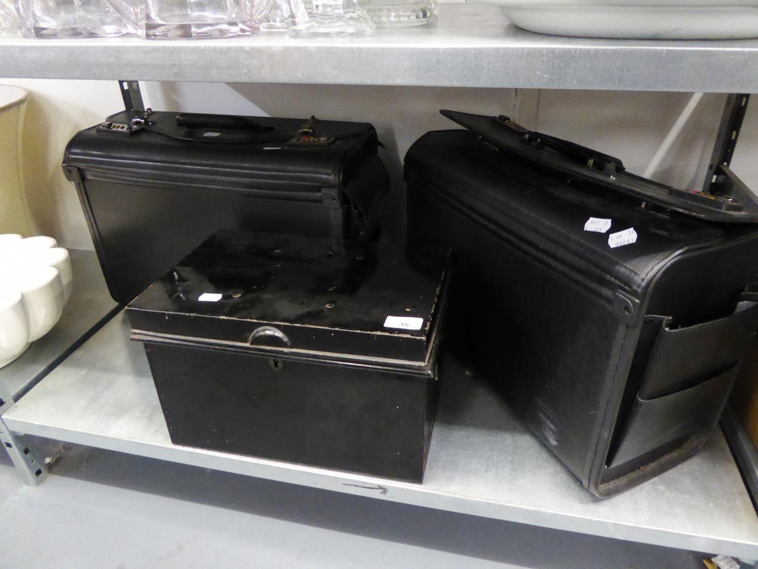 BLACK DEED BOX AND TWO LARGE BRIEFCASES (3)