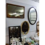 TWO FRAMED OVAL WALL MIRRORS AND TWO OBLONG WALL MIRRORS (4)