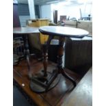 AN EARLY 19TH CENTURY MAHOGANY CIRCULAR TRIPOD TABLE AND ANOTHER WITH OVAL TOP (A.F.) (2)