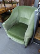 * AN EDWARDIAN GOOD QUALITY TUB CHAIR, COVERED IN GREEN FABRIC