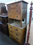 A SOLID OAK THREE DRAWER CHEST OF DRAWERS AND A SMALLER OAK THREE DRAWER CHEST (2)