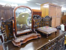 A MAHOGANY SHAPED SWING TOILET MIRROR (A.F.) AND A LOW MAHOGANY UPHOLSTERED FOOTSTOOL ON SMALL