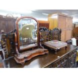 A MAHOGANY SHAPED SWING TOILET MIRROR (A.F.) AND A LOW MAHOGANY UPHOLSTERED FOOTSTOOL ON SMALL