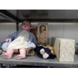 A LARGE COMPOSITION BABY DOLL WITH SLEEPING EYES, DRESSED (TORTOISE TRADE MARK) AND FOUR MODERN