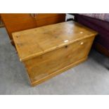 A NINETEENTH CENTURY PINE CHEST WITH LIFT-UP TOP