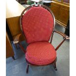 A PRIORY STYLE COMB BACK ROCKING CHAIR