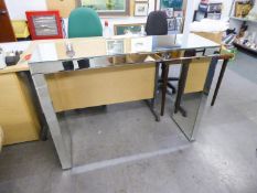 A MODERN MIRRORED CONSOLE TABLE