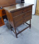 AN OAK THREE DRAWER CHEST FITTED FOR CUTLERY